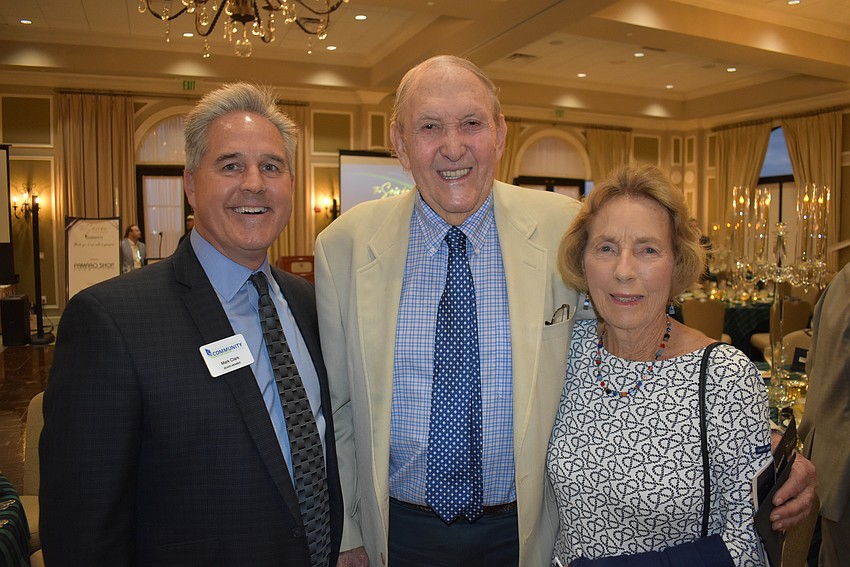 Lakewood Ranch Community Fund Board President Mark Clark visits with John and Lorna Clarke. John Clarke is the Lakewood Ranch Community Fund's founder.
