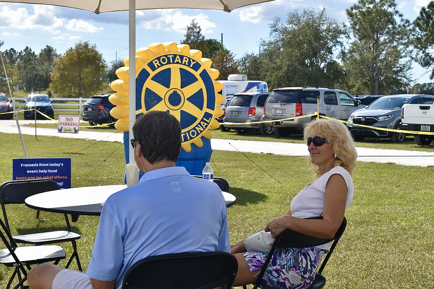 Daniela Dobrinova breaks from the wining and dining to listen to the band Kettle of Fish.