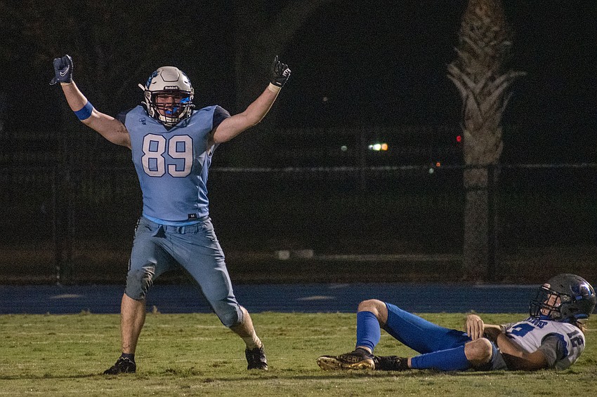 ODA senior Robert Crisci celebrates a sack of LPCA quarterback Chase Moore.