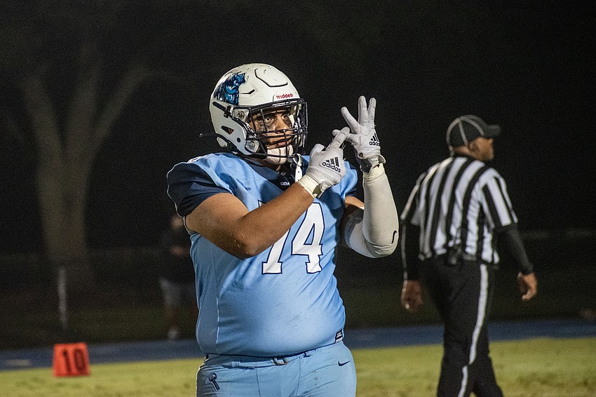 ODA junior Marvin Palominos points to his ring finger after the Thunder's SSAA Class 4A championship win over LPCA on Nov. 10. The Thunder ordered special championship rings following the win.