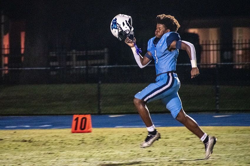 ODA junior Frankie Clark sprints in celebration following the Thunder's win over LPCA.