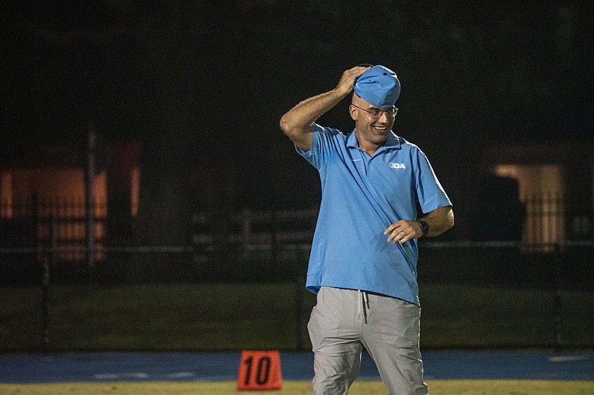 ODA Head Coach Rob Hollway turns his hat around after leading ODA to a win in the 2023 SSAA Class 4A championship game.