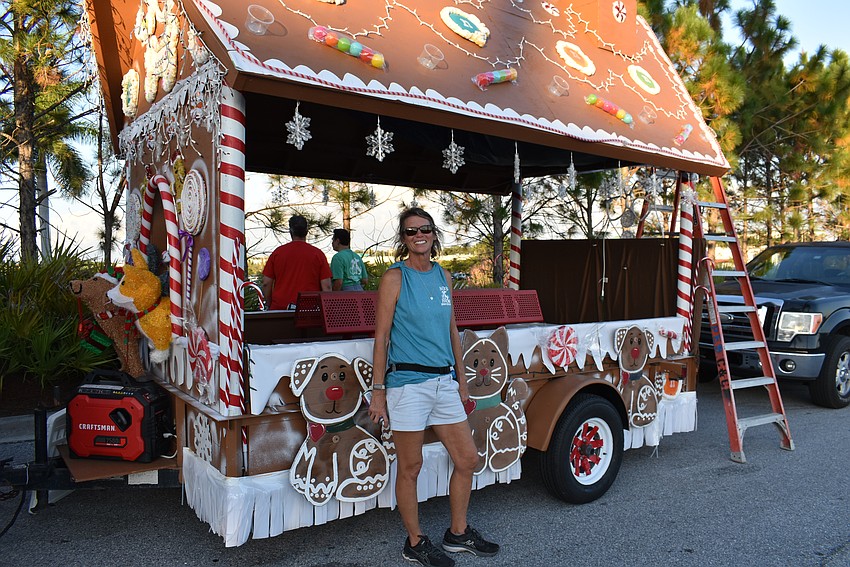 Suzanne Hoffman was still putting the finishing touches on the Nate's Honor Animal Rescue float for the Santa's Grand Arrival Parade.