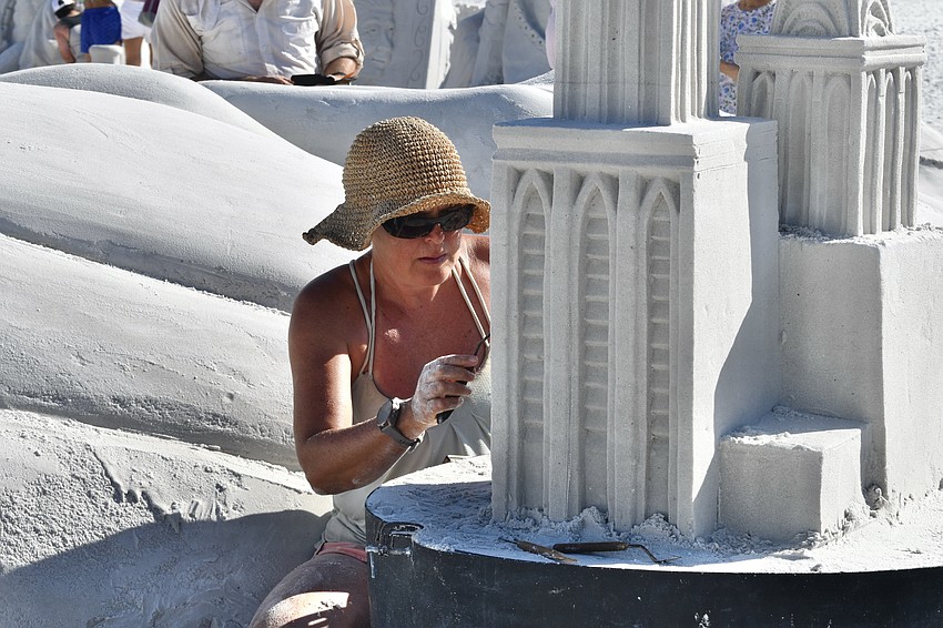 Edith van de Wetering of the Netherlands works on the sculpture 