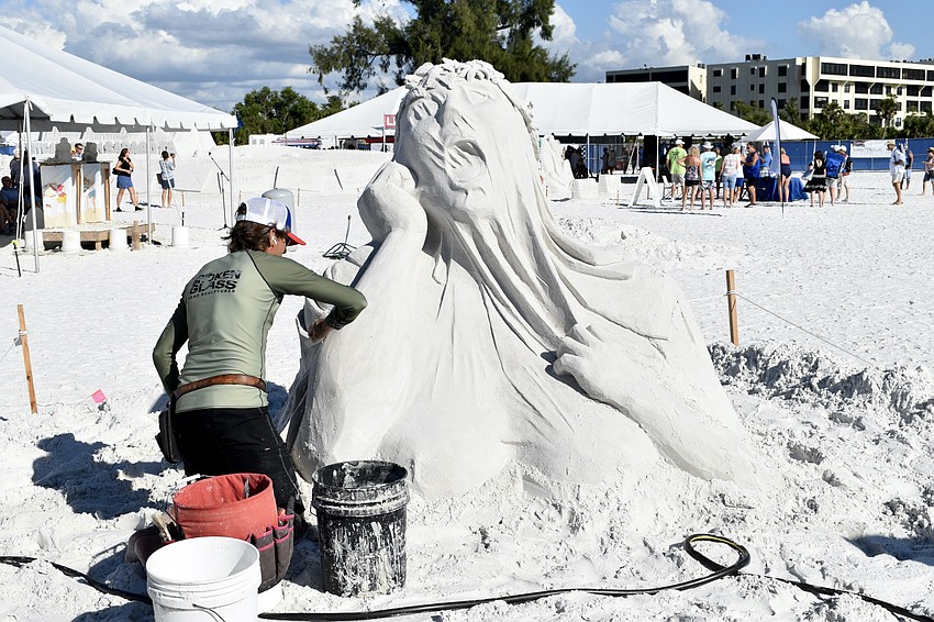 Chris Guinto of Key West, Florida works on his sculpture.