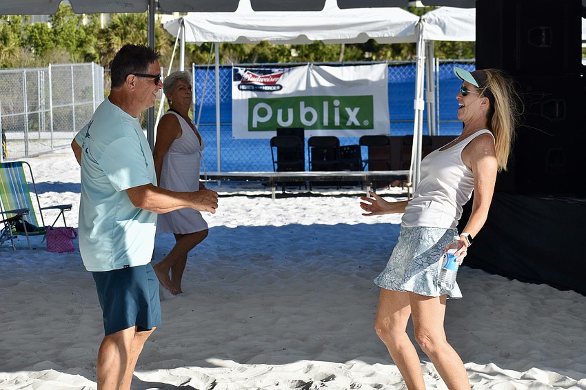 Larry and Tina Landry dance to live music.