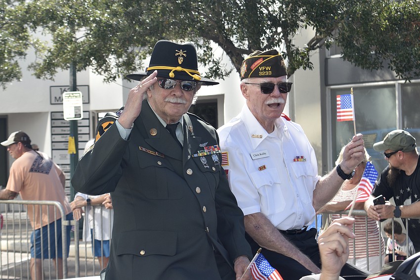 David Bonci and Chris Keilty of VFW Post 3223 make their way down Main Street.