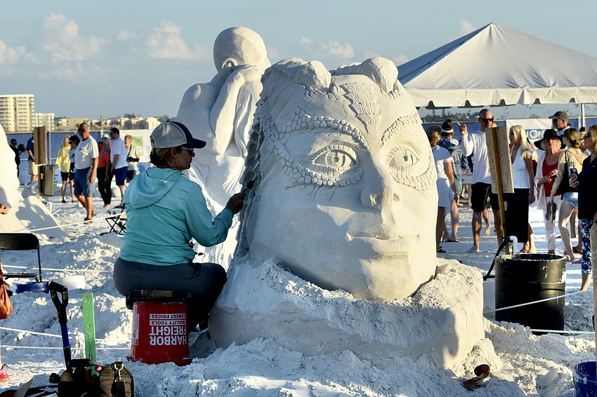 Amanda Bolduc from Maine, USA, works on her sculpture.