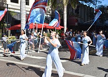 Members of the Venice High School marching band offer a performance.
