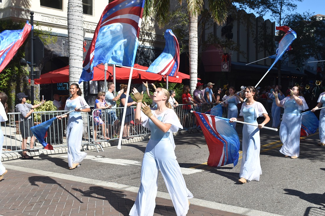Members of the Venice High School marching band offer a performance.