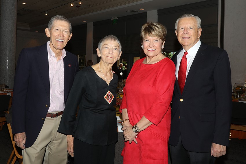 Co-chairs Gene and Kathy Jongsma, Jeri Sedlar and Rick Miners take time for a photo before their guests arrive.