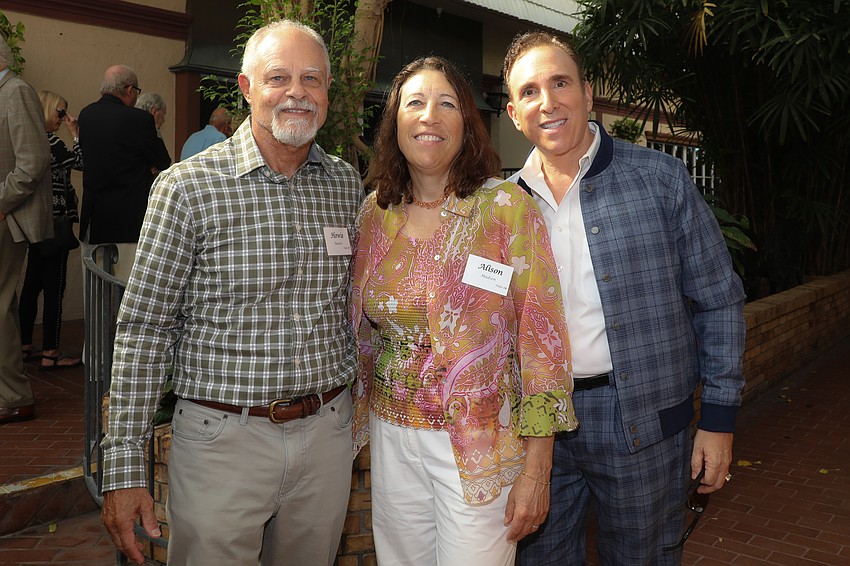 Howie Madsen, board member Alison Madsen and Brian Lipton.