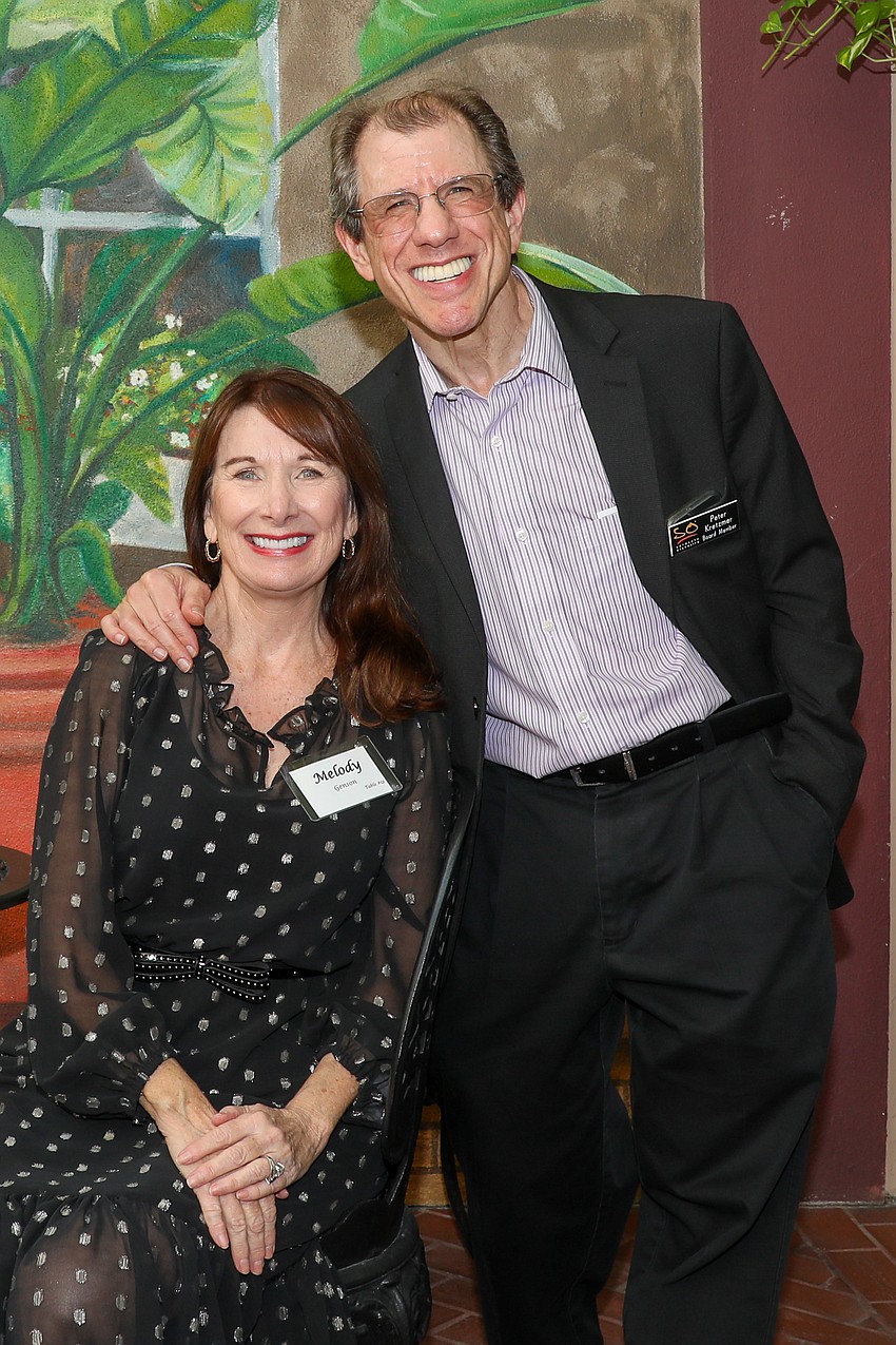 Recently betrothed and all smiles are Melody Genson and board member Peter Kretzmer.