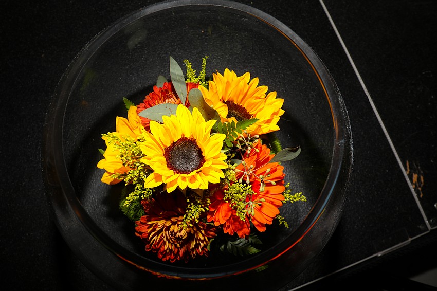 Gorgeous flowers placed in large bowls were the centerpieces at each table.
