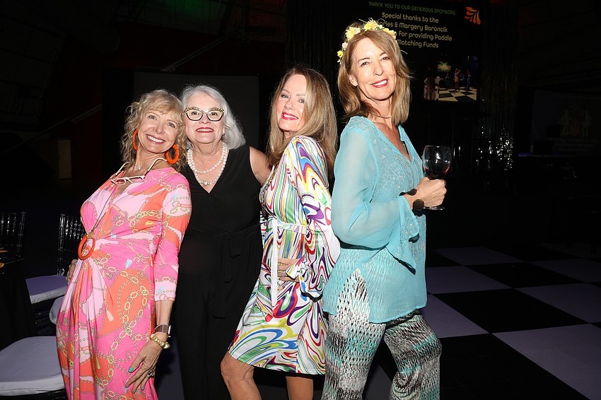 Charlie Ann Syprett, Sheila Eagan, Rita Greenbaum and Penny Hill ham it up in their '70s garb.