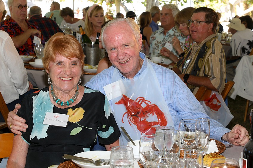 Priscilla and Jack Schleger are lobster-bibbed up and ready for the Michael's On East crustacean feast.