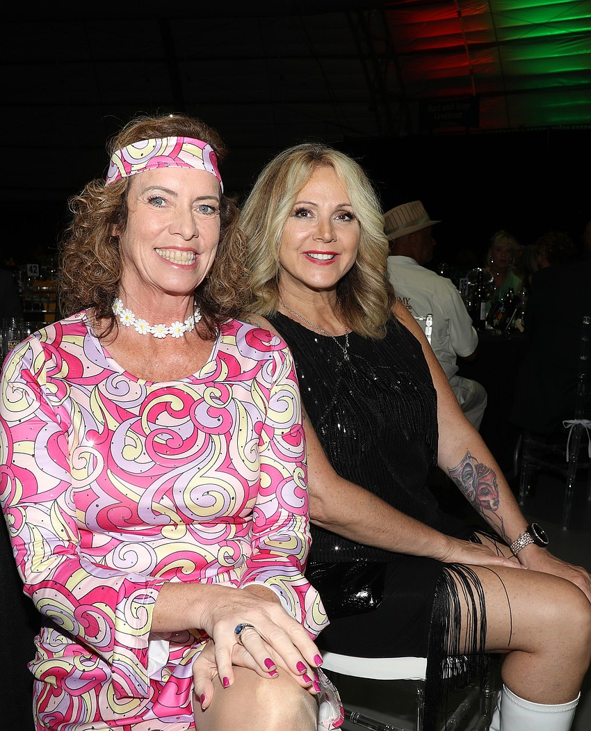 Katie Burke and Melody Martin enjoy the '70s vibes.