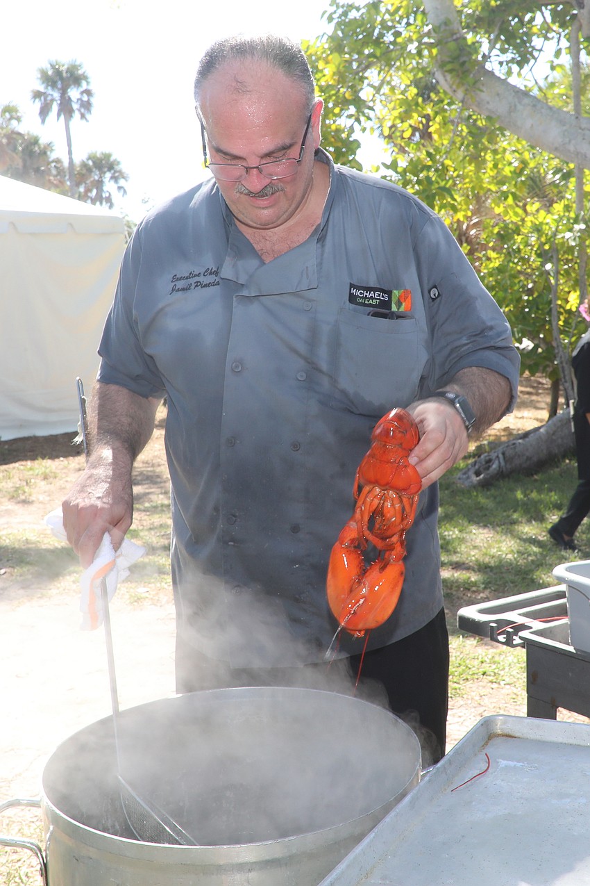 Michael's On East Executive Chef Jamil Pineda steams lobsters for guests at Hermitage Artist Retreat on Manasota Key.