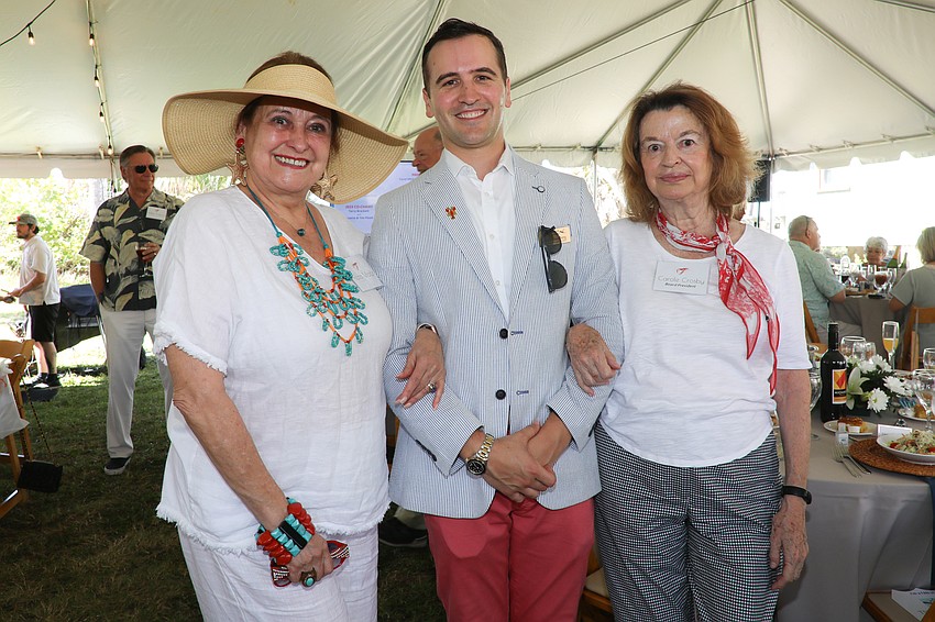 Flora Major, Artistic Director and CEO Andy Sandberg and board President Carole Crosby
