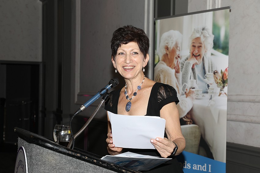 Karen Zelden, chief development officer, emcees the Aviva Keep the Dream Alive event.