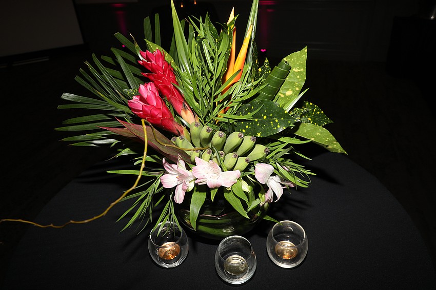 Suncoast Florist designed the table centerpieces.