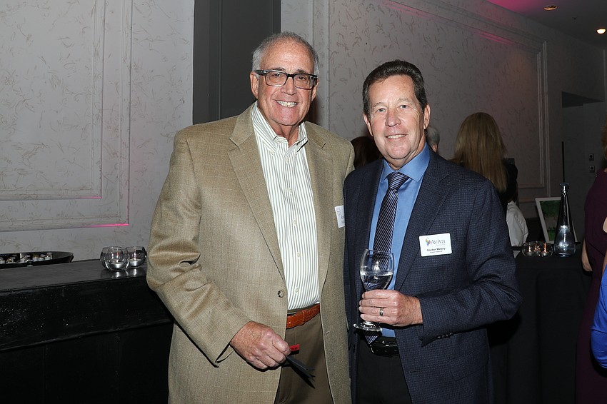 Former board President Randy Mallitz with board Treasurer, Gordon Metsky.