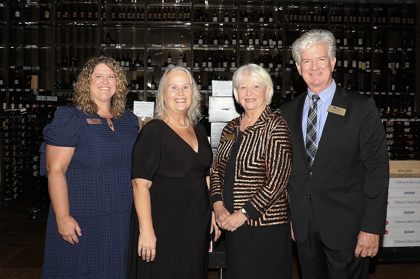 Interim President of the Pines Foundation Andrea Stephens, Jodi Cherry, board Chair Jane Hunder and Pines President and CEO Mike Ward