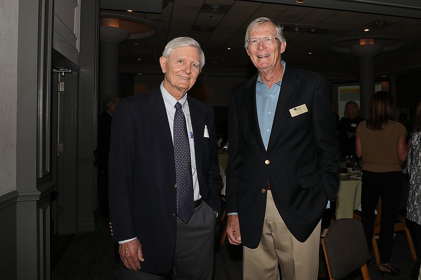 Kyle Booth and board member John Schaub