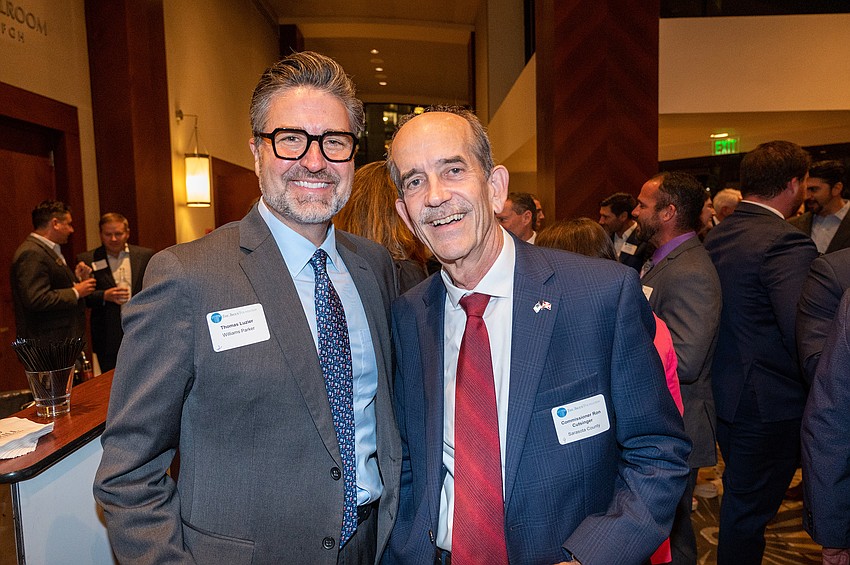 Thomas Luzier and Sarasota County Commissioner Ron Cutsinger
