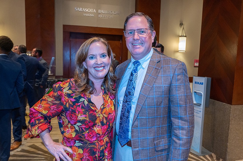 Retta and John Wagner