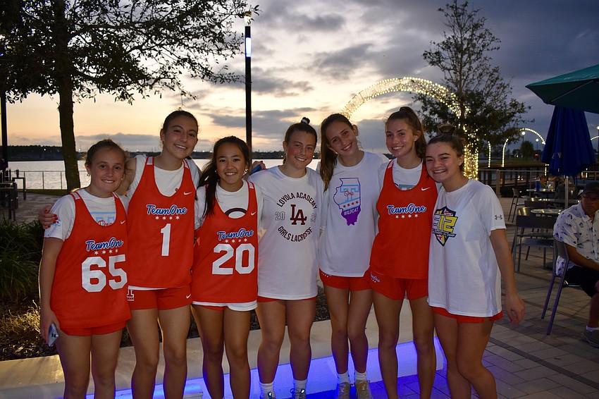 Molly Robson, Elle Anderson, Lucy Rossman, Francie Ryan, Bridget Lesch, Madison Rewey and Finley Breen stop by Waterside Place after playing lacrosse at the Premier Sports Campus.