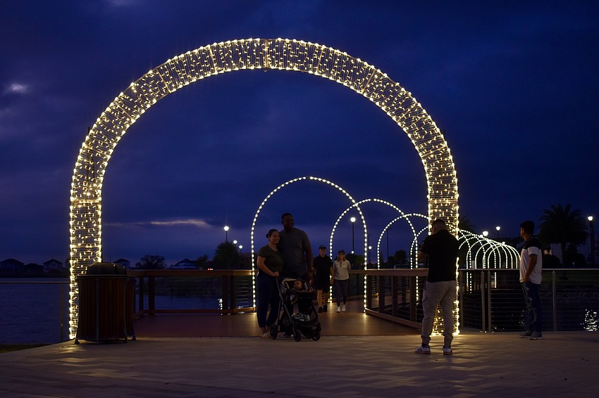 The lighted archway at Waterside Place has residents stopping to take photos.