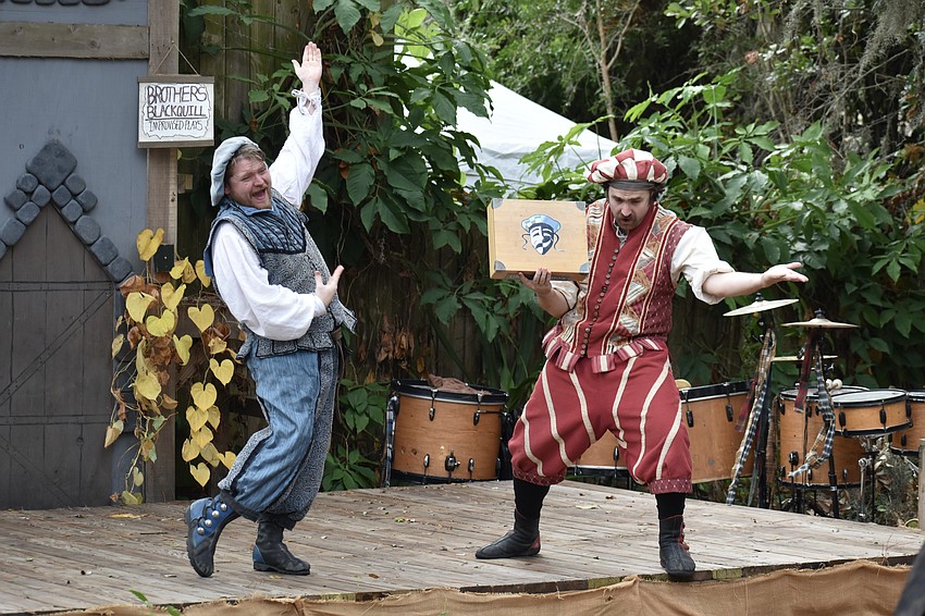 Jonathan Blackquill and “Quentin Blackquill” perform in a stage show by The Blackquill Brothers.