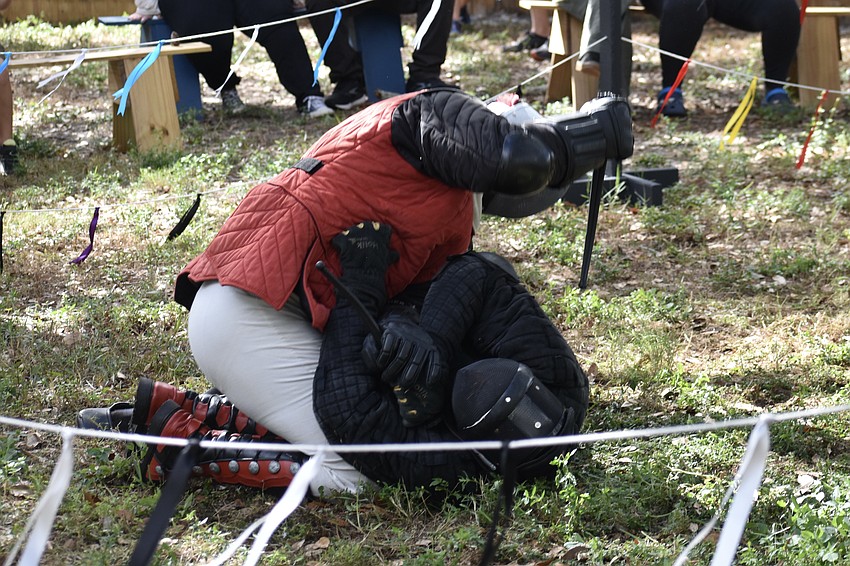Neal Voor overcomes his opponent Chris Fontana during a demonstration by Steel Ring Academy.