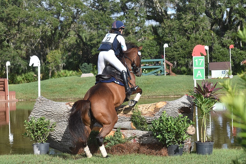 D'Wild Expectation muscles over a jump with Ocala's Elizabeth Pagan aboard during the cross country event on Saturday.