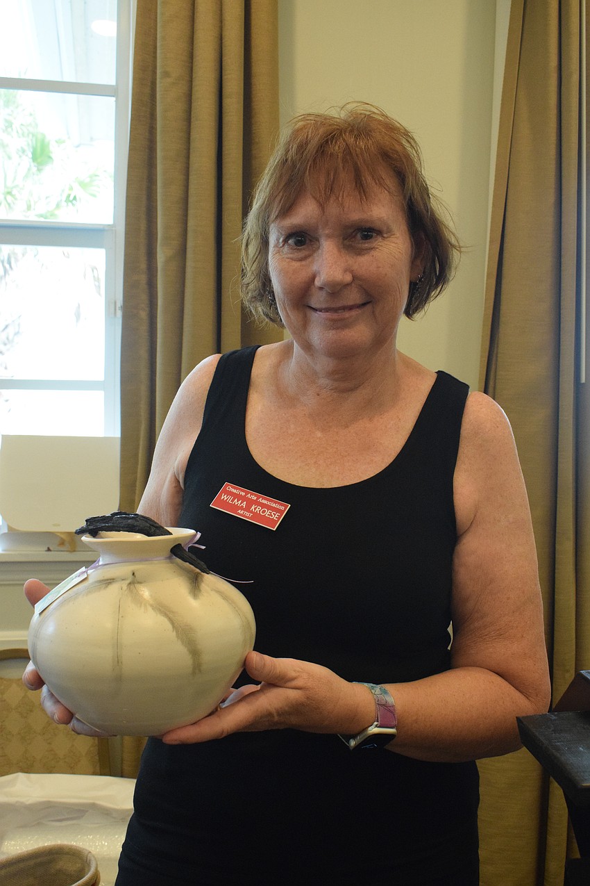 Mill Creek's Wilma Kroese has started using feathers and horse hair in her glazed artwork. 