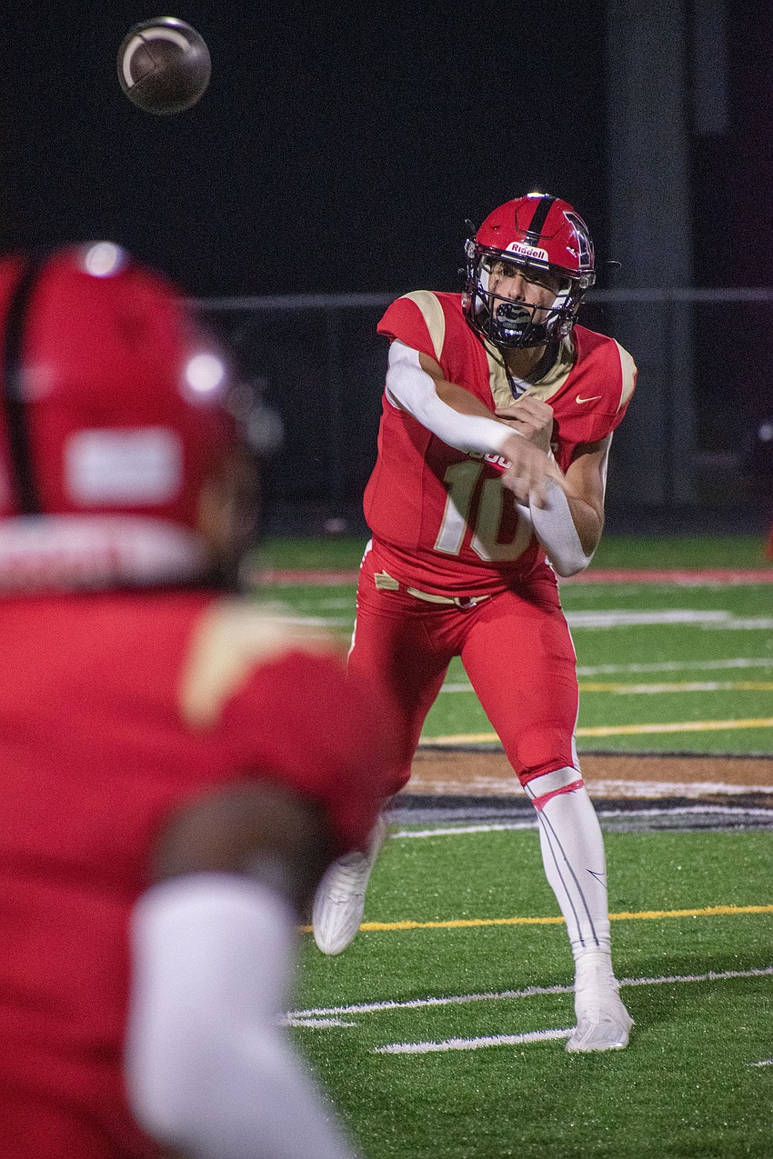 Cardinal Mooney senior Michael Valentino throws a pass. Valentino threw two touchdowns against Lakeland Christian.