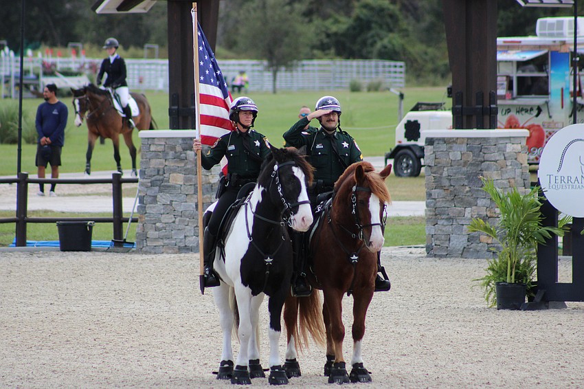 Lauren Bradley and Zach Bradley of the Manatee County Sheriff's Office Mounted Patrol presented the colors during Nov. 18's action at The Event at TerraNova in Myakka City.