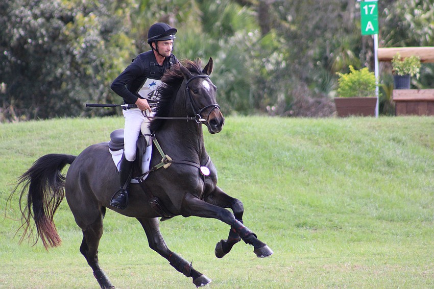 Waylon Roberts of Canada rides Fernhill Salt Lake as they change speeds while approaching a jump during the Event at TerraNova Nov. 18 in Myakka.