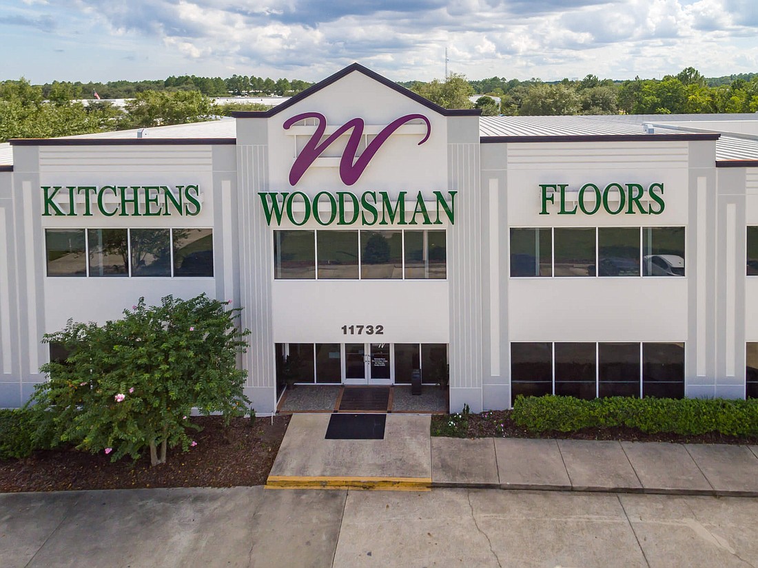 The Woodsman Kitchens and Floors retail store and warehouse at 11732 Beach Blvd.