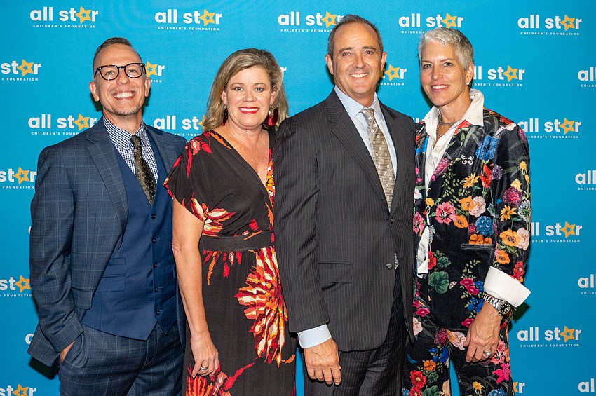 Dane Gass and Robyn Sadlo with Dean and Lizzie Hautmaki