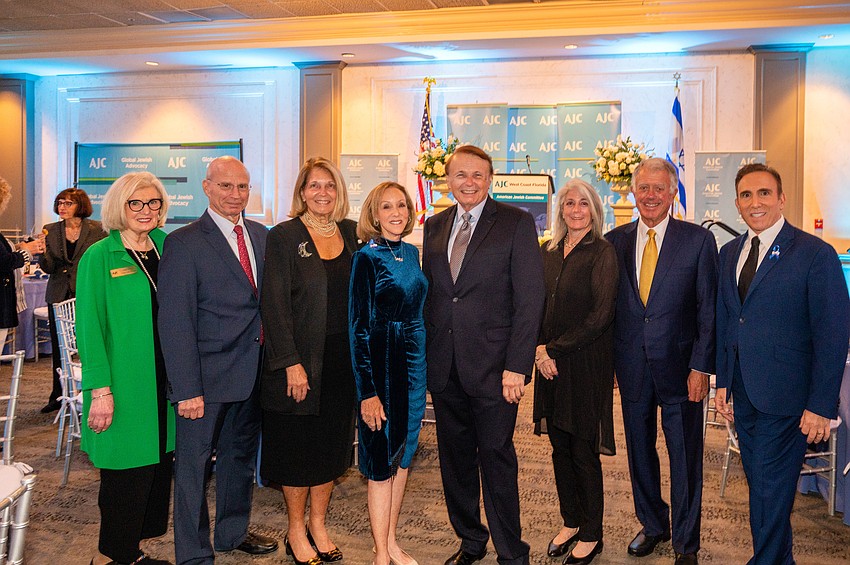 Regional President Anne Virag , event chairs Drs. Joel and  Gail Morganroth and Deb Kabinoff, award recipient Larry Thompson,  event chairs Marcy and Michael Klein and AJC Regional Director Brian Lipton