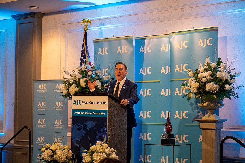 AJC Regional Director Brian Lipton addresses dinner guests.