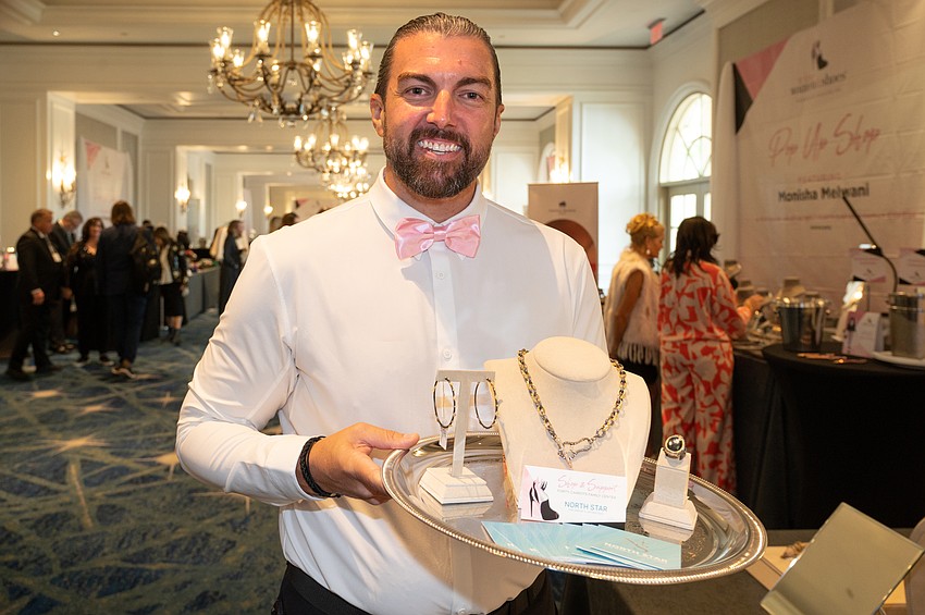 Soleman David Perkowski presents some items for sale.