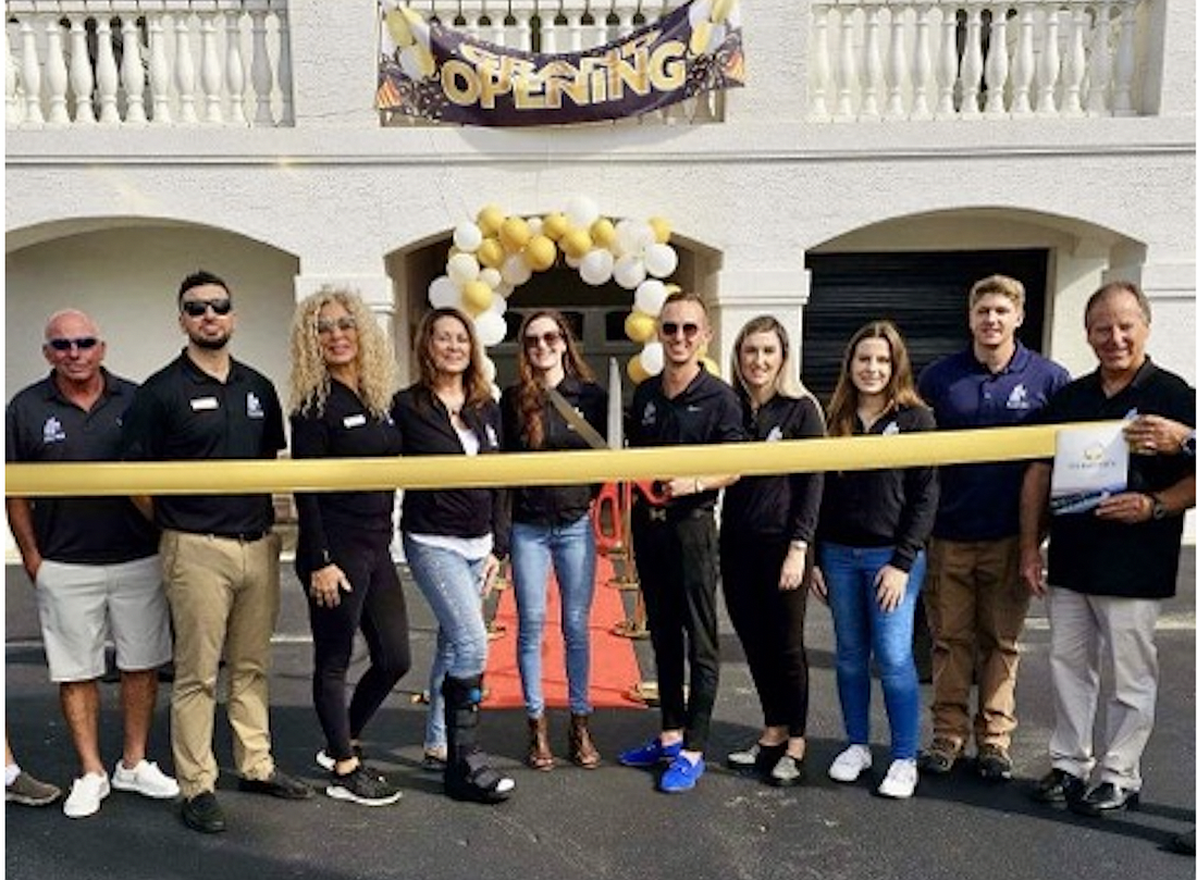 The Zander Holding Group team at the Grand Vista Condos' ribbon cutting ceremony and public open house on Nov. 18. Photo courtesy of the Zander Holding Group of Palm Coast