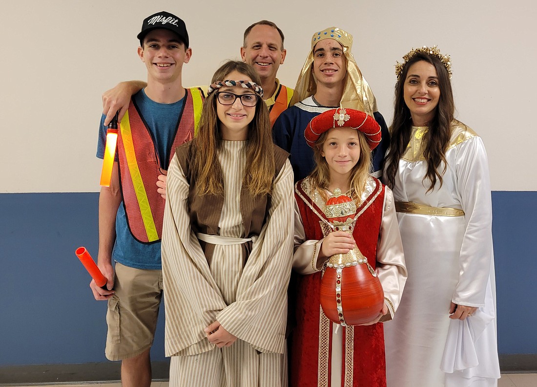 Whether a parking attendant, Joseph's angel, a wise man's attendant, an angel or any other role, the Walmsley family loves coming together to participate in the living nativity each year.