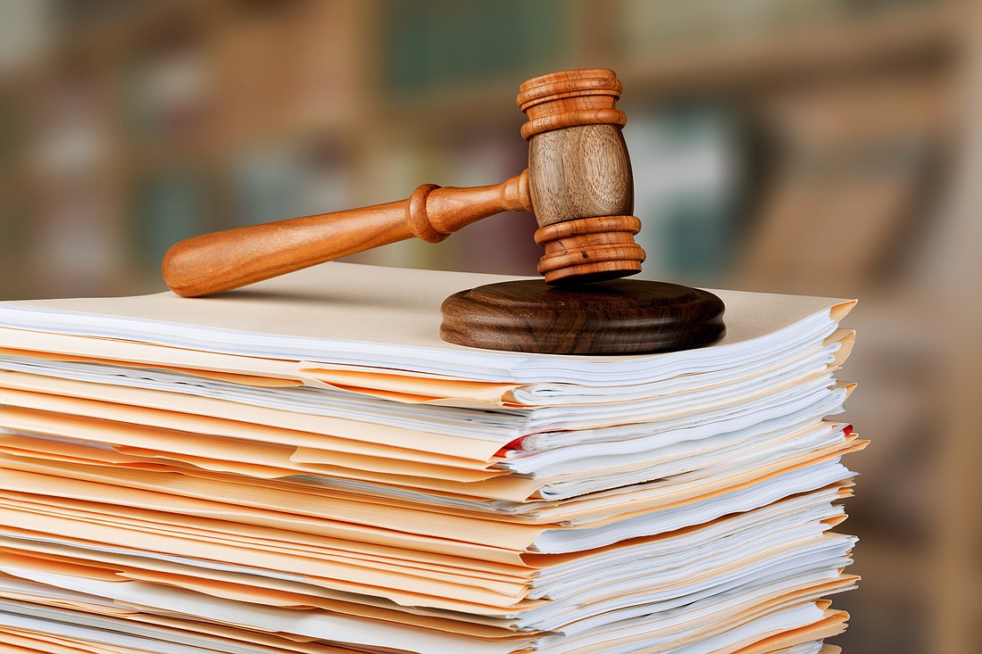 Gavel and documents. Photo from Adobe Stock