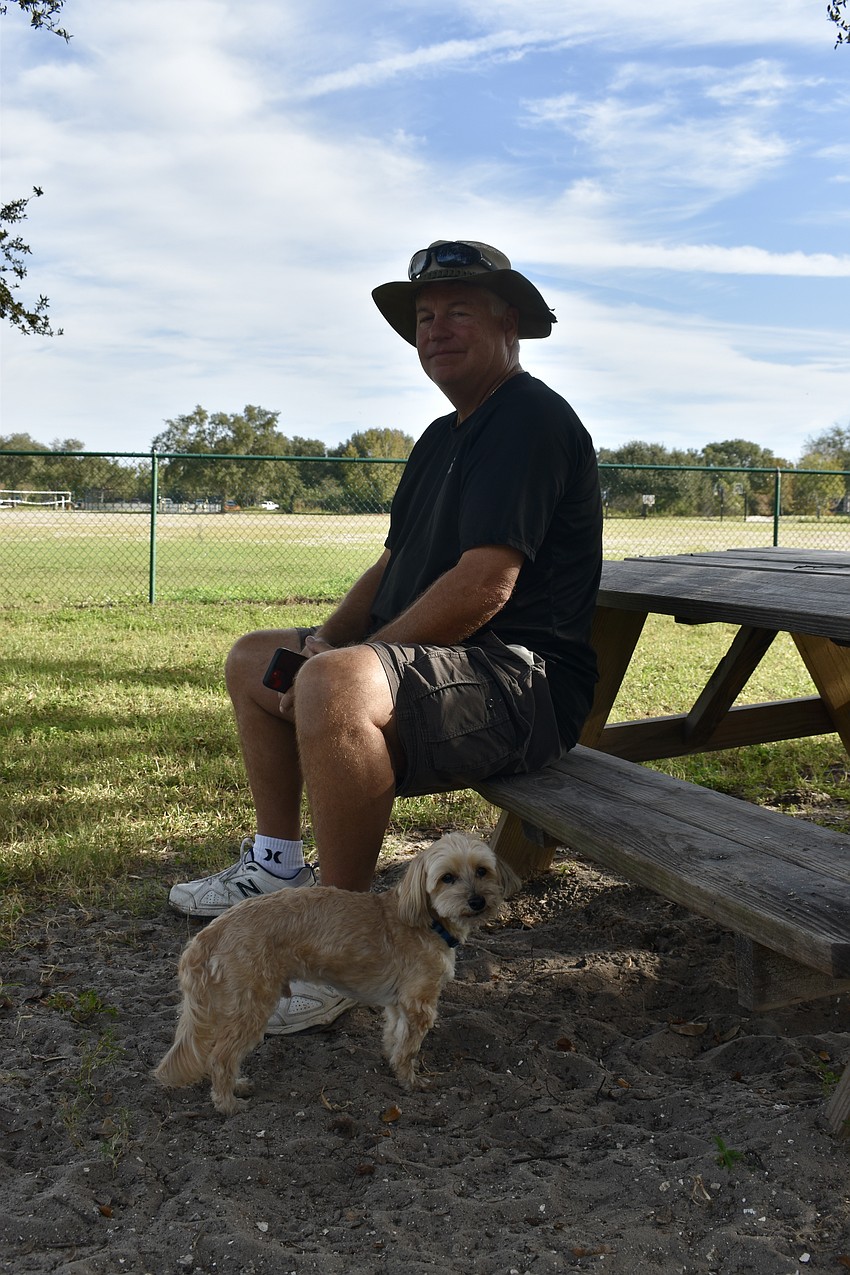 David Jones and Max the Maltipoo visit the park every day.