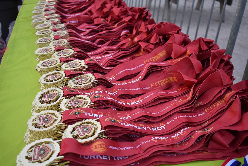 More than 4,000 medals were awaiting the runners as they crossed the finish line of the Florida Turkey Trot Thanksgiving morning at Nathan Benderson Park.