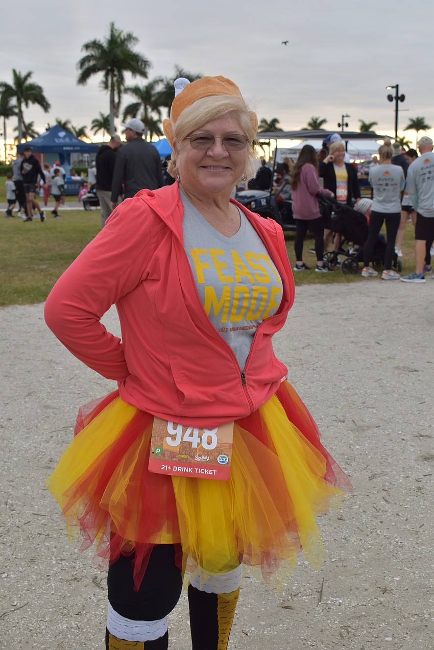 Sarasota's Donna Krusenoski has run in all six Florida Turkey Trots at Nathan Benderson Park, but this is the first she ran with a turkey on her head. The day after last year's race, she ordered the hat, along with turkey leg socks.